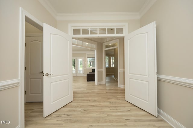 4217 Grahamstone Rd, Raleigh, NC 27610 - corridor with light wood-style floors and crown molding