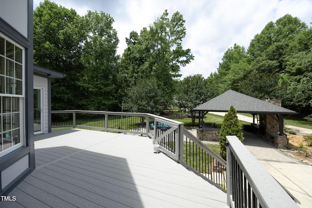 4217 Grahamstone Rd, Raleigh, NC 27610 - wooden deck with a gazebo and view of scattered trees