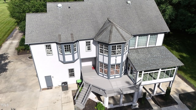 4217 Grahamstone Rd, Raleigh, NC 27610 - back of house with a patio, stairway, roof with shingles, and a wooden deck