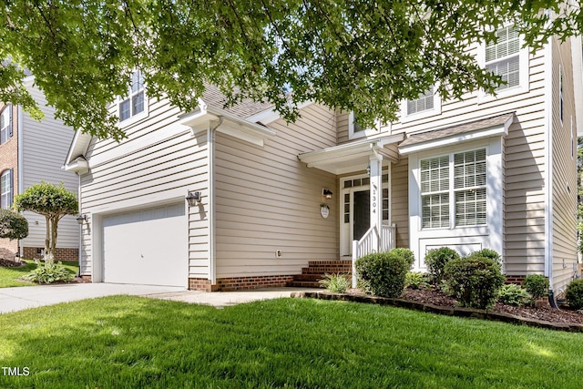 1304 Trailing Rose Ct, Wake Forest, NC 27587 - view of front of house featuring an attached garage, a front yard, and driveway
