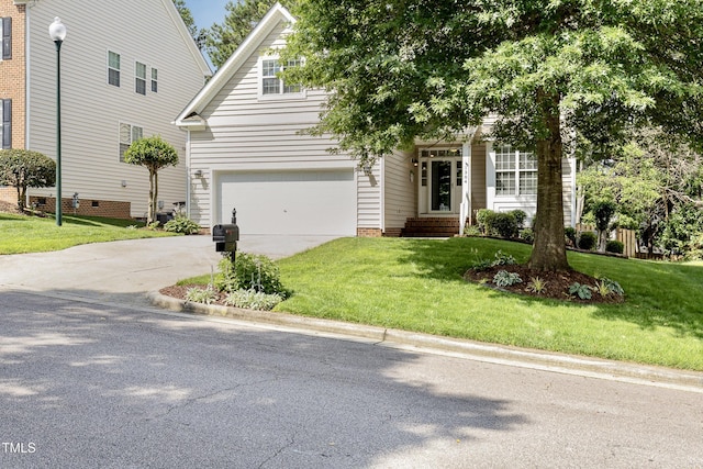 1304 Trailing Rose Ct, Wake Forest, NC 27587 - obstructed view of property with concrete driveway, a front yard, and a garage