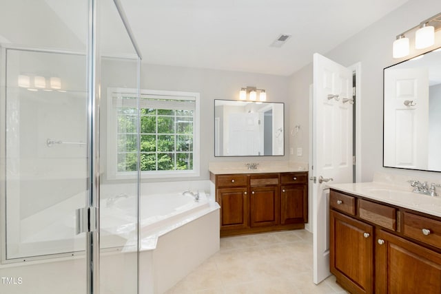 1304 Trailing Rose Ct, Wake Forest, NC 27587 - full bath with two vanities, a bath, tile patterned flooring, and a shower stall