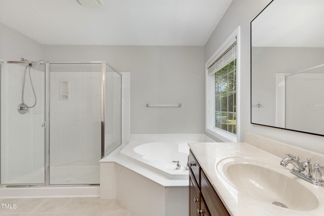 1304 Trailing Rose Ct, Wake Forest, NC 27587 - bathroom with a shower stall, vanity, a garden tub, and tile patterned flooring