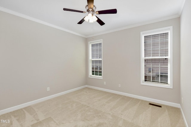1304 Trailing Rose Ct, Wake Forest, NC 27587 - empty room featuring light carpet, ornamental molding, and a ceiling fan