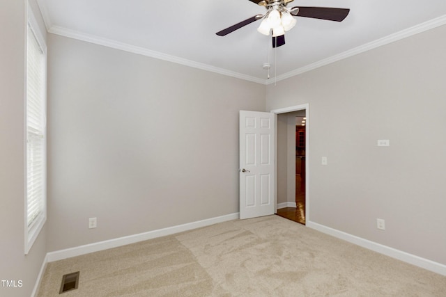 1304 Trailing Rose Ct, Wake Forest, NC 27587 - carpeted empty room with ceiling fan and ornamental molding