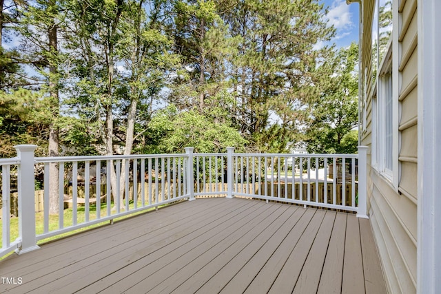 1304 Trailing Rose Ct, Wake Forest, NC 27587 - wooden deck with view of scattered trees
