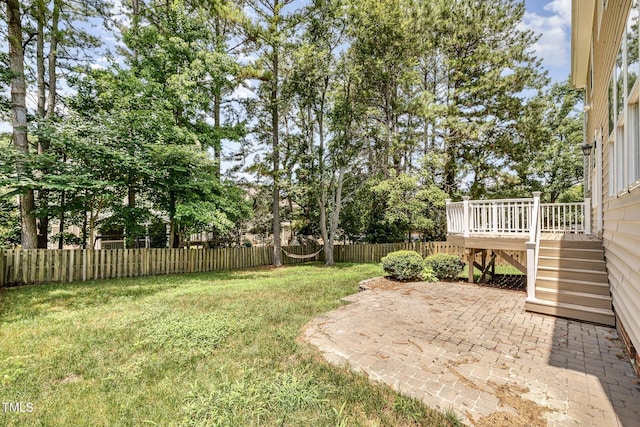 1304 Trailing Rose Ct, Wake Forest, NC 27587 - fenced backyard featuring a patio area, stairway, and a deck