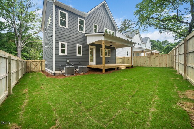 905 Deboy St, Raleigh, NC 27606 - back of house with a wooden deck, a fenced backyard, ceiling fan, and a gate