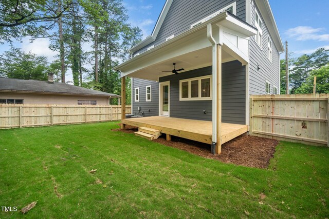905 Deboy St, Raleigh, NC 27606 - back of property with a fenced backyard, a ceiling fan, and a wooden deck