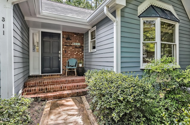 311 Westbrook Dr, Carrboro, NC 27510 - doorway to property featuring brick siding
