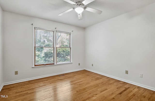 311 Westbrook Dr, Carrboro, NC 27510 - unfurnished room with light wood-style floors and a ceiling fan