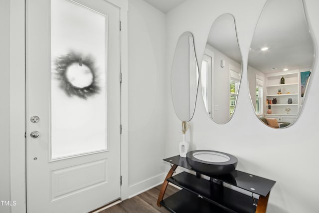 513 Basin Hill Dr, Wake Forest, NC 27587 - foyer featuring dark wood-style floors and baseboards