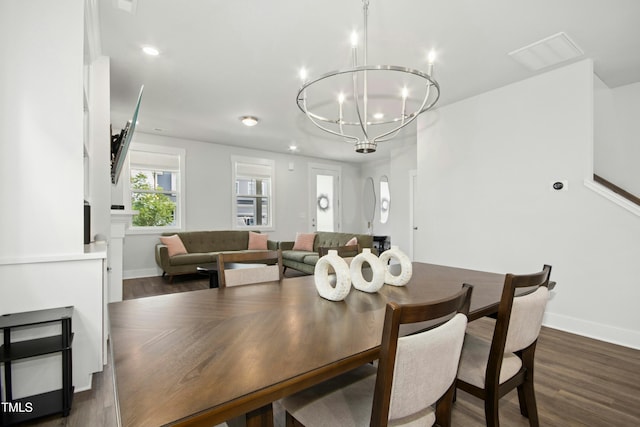 513 Basin Hill Dr, Wake Forest, NC 27587 - dining area featuring a chandelier, dark wood-style flooring, and recessed lighting