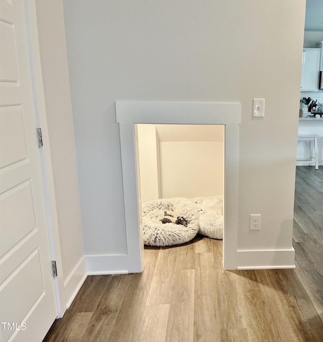513 Basin Hill Dr, Wake Forest, NC 27587 - hallway with wood finished floors