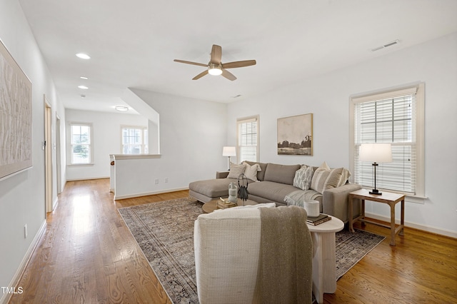 1217 Chalk Maple Dr, Cary, NC 27519 - living area with a ceiling fan, wood finished floors, and recessed lighting