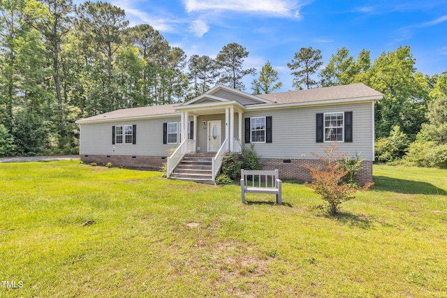 589 Atkinson Mill Rd, Selma, NC 27576 - view of front of house featuring crawl space, a front lawn, and a shingled roof