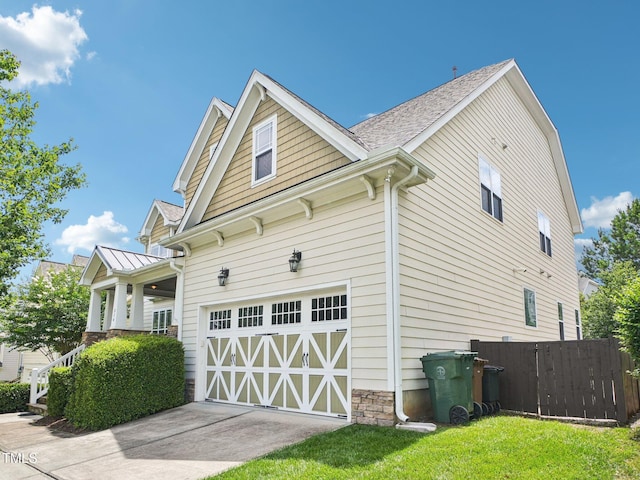 214 Ashdown Forest Ln, Cary, NC 27519 - view of home's exterior featuring driveway and a garage