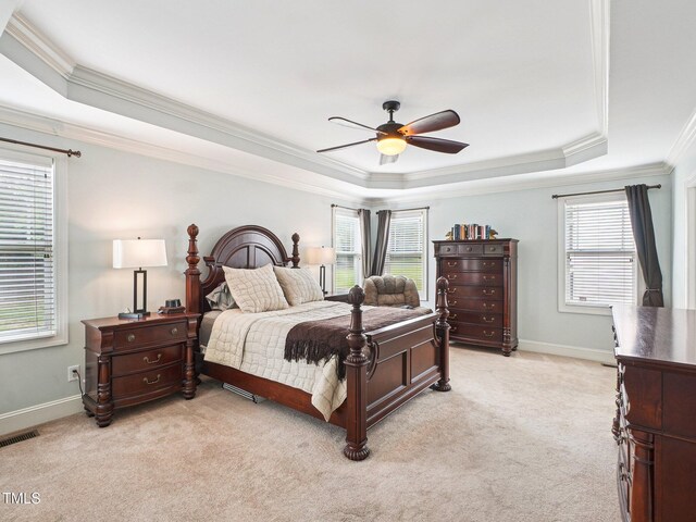 214 Ashdown Forest Ln, Cary, NC 27519 - bedroom featuring a raised ceiling, crown molding, light colored carpet, and ceiling fan