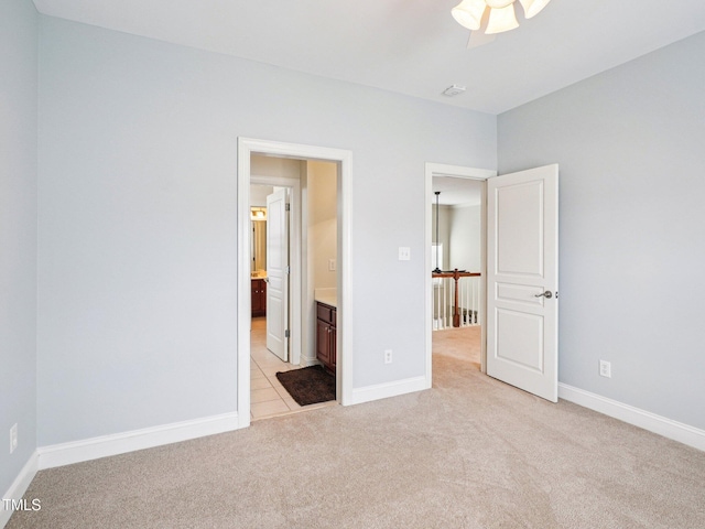214 Ashdown Forest Ln, Cary, NC 27519 - unfurnished bedroom with light carpet and ensuite bath