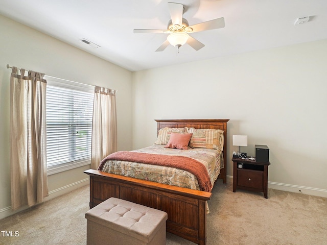 214 Ashdown Forest Ln, Cary, NC 27519 - bedroom with light colored carpet and a ceiling fan