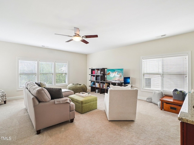 214 Ashdown Forest Ln, Cary, NC 27519 - living room with light colored carpet and ceiling fan