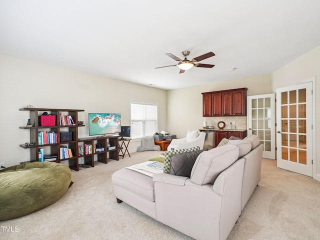 214 Ashdown Forest Ln, Cary, NC 27519 - living area featuring light carpet and a ceiling fan