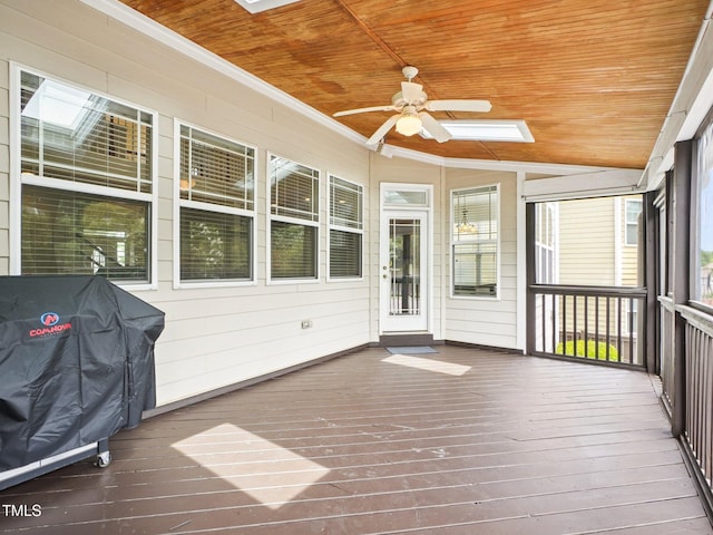 214 Ashdown Forest Ln, Cary, NC 27519 - unfurnished sunroom featuring a ceiling fan and a skylight