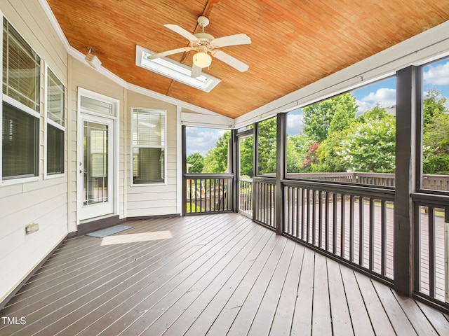 214 Ashdown Forest Ln, Cary, NC 27519 - unfurnished sunroom featuring a skylight, a ceiling fan, and vaulted ceiling