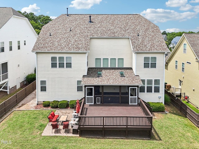 214 Ashdown Forest Ln, Cary, NC 27519 - rear view of house with a fenced backyard, a wooden deck, roof with shingles, a patio area, and a sunroom