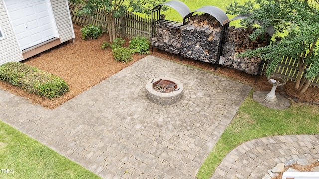 1033 Mills St, Raleigh, NC 27608 - view of yard with an outdoor fire pit and a patio area