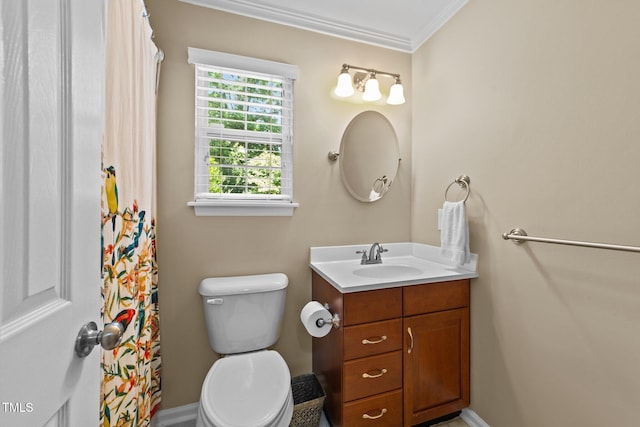 1033 Mills St, Raleigh, NC 27608 - bathroom featuring vanity and ornamental molding