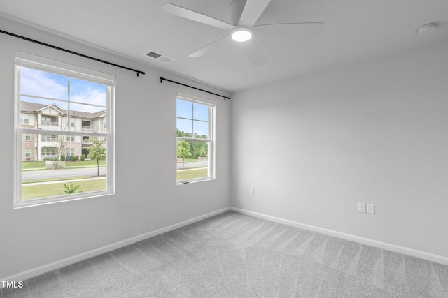 2539 Kasota Ln, Raleigh, NC 27610 - unfurnished room featuring a smoke detector, light carpet, and a ceiling fan