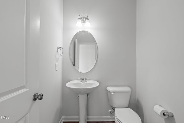 2539 Kasota Ln, Raleigh, NC 27610 - bathroom with toilet and baseboards