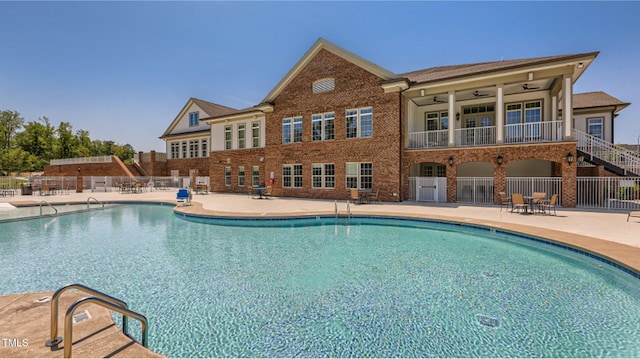 2539 Kasota Ln, Raleigh, NC 27610 - community pool with a patio and a ceiling fan