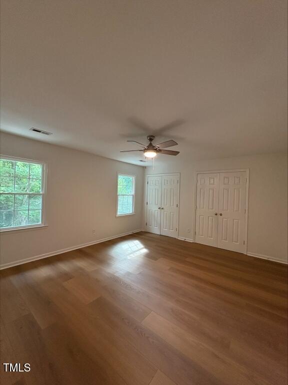 1300 Seabrook Ave, Cary, NC 27511 - unfurnished room with wood finished floors and a ceiling fan