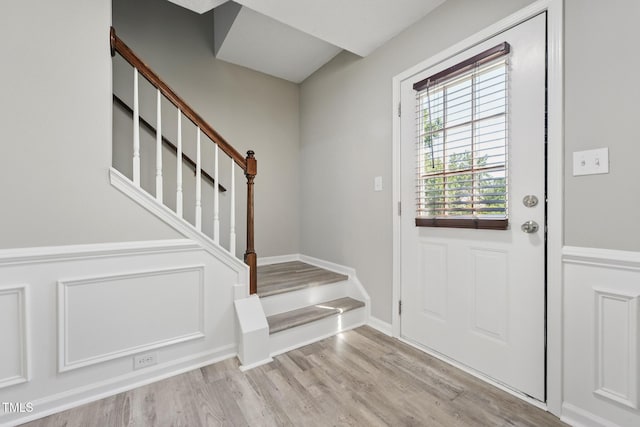 105 Leacroft Way, Durham, NC 27703 - doorway with light wood finished floors and stairway