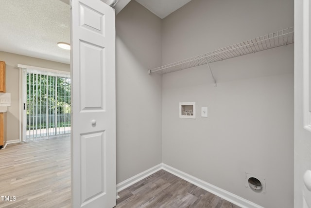 105 Leacroft Way, Durham, NC 27703 - laundry room featuring light wood-type flooring, hookup for an electric dryer, and hookup for a washing machine