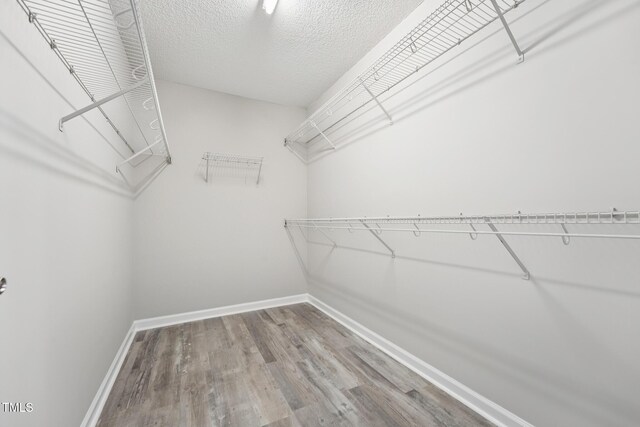 105 Leacroft Way, Durham, NC 27703 - spacious closet with wood finished floors