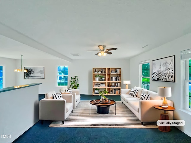 308 Quartz Dr, Durham, NC 27703 - living area with a ceiling fan and carpet flooring