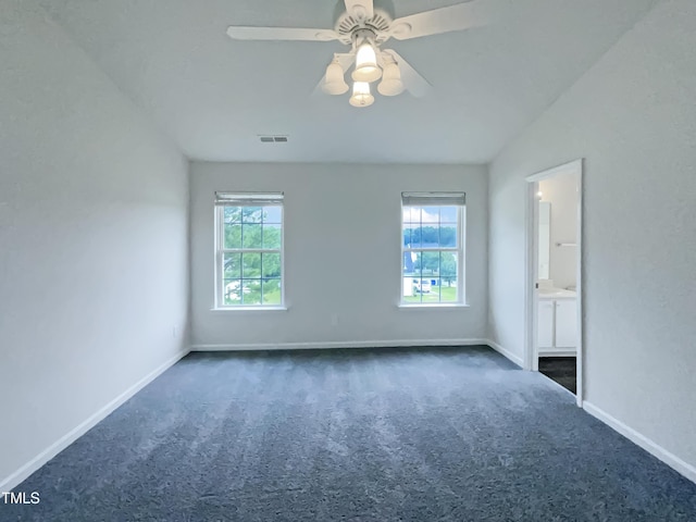 308 Quartz Dr, Durham, NC 27703 - carpeted empty room featuring baseboards and ceiling fan