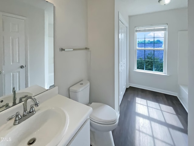 308 Quartz Dr, Durham, NC 27703 - full bathroom with vanity and wood finished floors