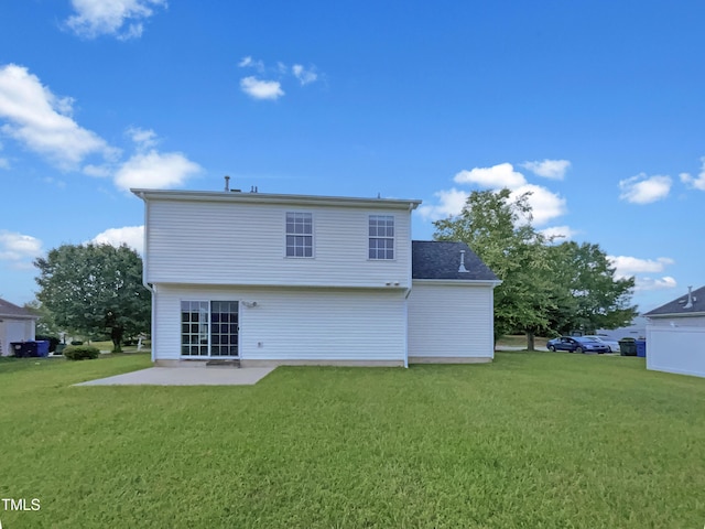 308 Quartz Dr, Durham, NC 27703 - rear view of house with a patio area and a yard