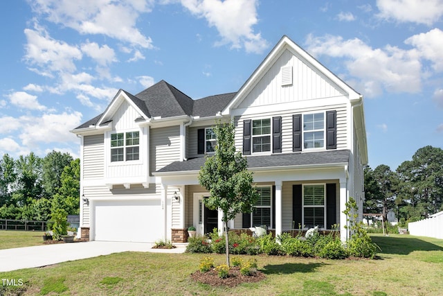 124 Airlie Place Ln, Willow Springs, NC 27592 - view of front of house with board and batten siding, an attached garage, driveway, a porch, and a shingled roof
