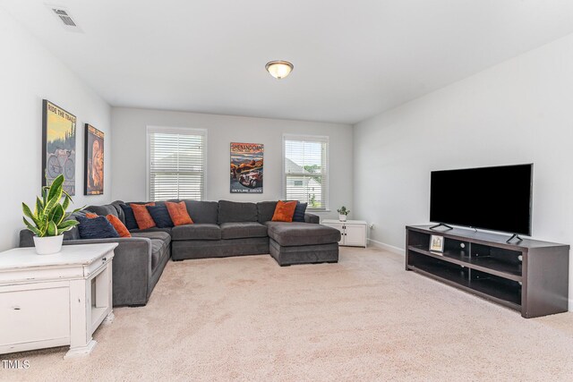 124 Airlie Place Ln, Willow Springs, NC 27592 - living room featuring light carpet and baseboards