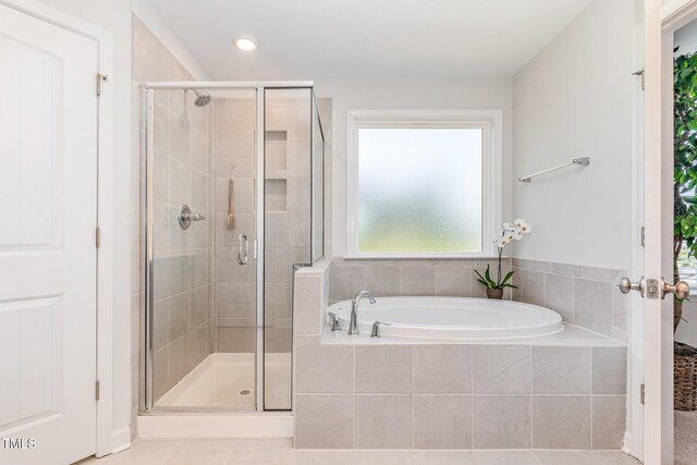 124 Airlie Place Ln, Willow Springs, NC 27592 - bathroom featuring a bath, a stall shower, tile patterned flooring, and recessed lighting