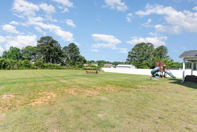 124 Airlie Place Ln, Willow Springs, NC 27592 - view of yard with a playground