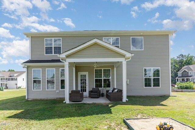 124 Airlie Place Ln, Willow Springs, NC 27592 - back of house with a ceiling fan, an outdoor hangout area, a yard, and a patio