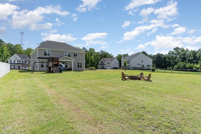 124 Airlie Place Ln, Willow Springs, NC 27592 - view of yard featuring an outdoor fire pit