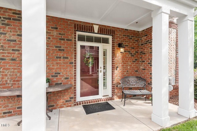 10310 Sablewood Dr Unit 115, Raleigh, NC 27617 - property entrance featuring brick siding and a porch