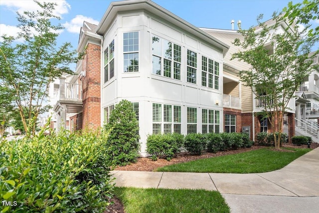 10310 Sablewood Dr Unit 115, Raleigh, NC 27617 - view of side of property featuring brick siding